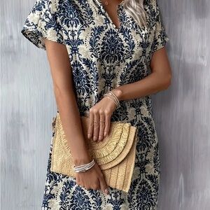 Navy and Cream Patterned Dress with Woven Clutch